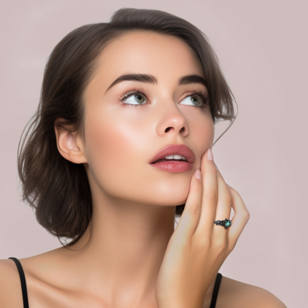 black gold emerald ring